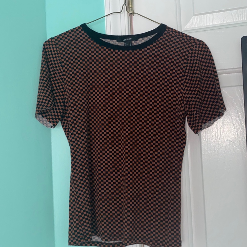 orange and black checkerboard, tight fitting shirt